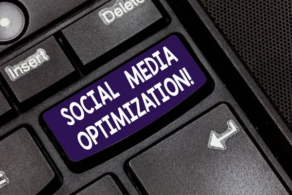 Writing note showing Social Media Optimization. Business photo showcasing Digital strategy Generate viral publicity Keyboard key Intention to create computer message pressing keypad idea.