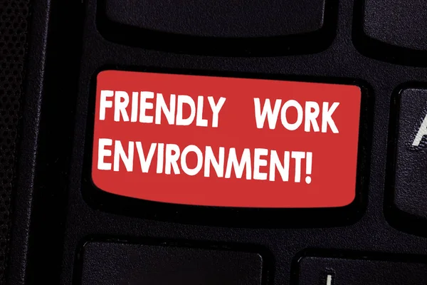 Handwriting text Friendly Work Environment. Concept meaning Integrating stronger social dynamics workplace Keyboard key Intention to create computer message pressing keypad idea.