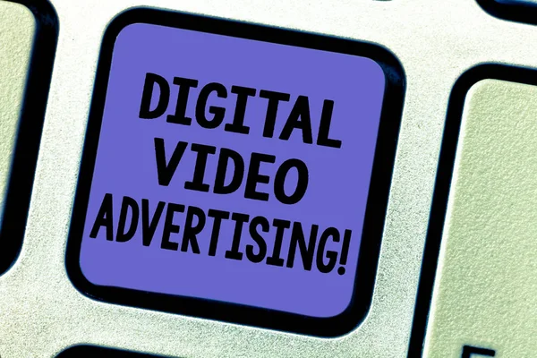 Text sign showing Digital Video Advertising. Conceptual photo Engage audience in the form of video content Keyboard key Intention to create computer message pressing keypad idea.