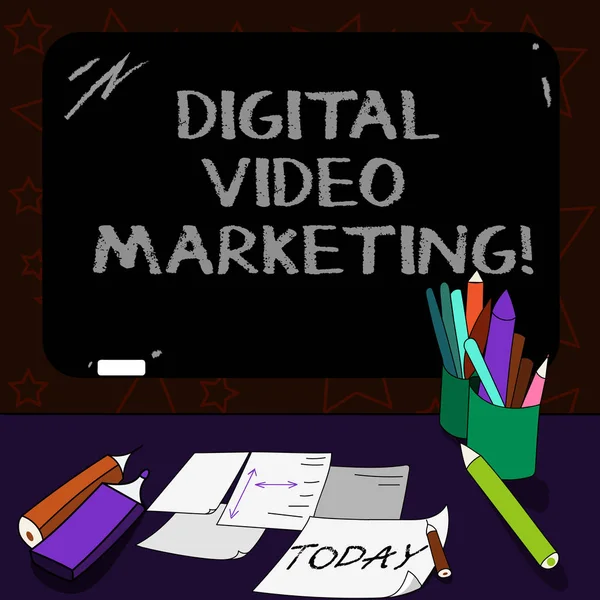 Writing note showing Digital Video Marketing. Business photo showcasing uses of video contents to promote a brand or product Mounted Blackboard with Chalk Writing Tools Sheets on Desk.