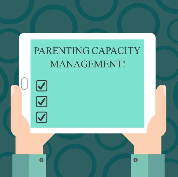 Writing note showing Parenting Capacity Management. Business photo showcasing parents ability to protect children from risk Hu analysis Hand Holding Tablet Smartphone Display Unit photo. — Stok fotoğraf