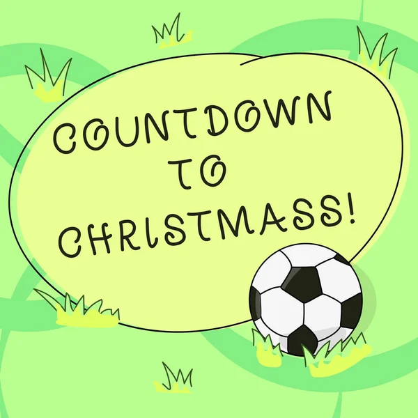 Writing note showing Countdown To Christmas. Business photo showcasing period of time leading up to a significant event Soccer Ball on the Grass and Blank Outlined Round Color Shape photo.