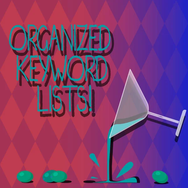 Handwriting text Organized Keyword Lists. Concept meaning Taking list of keywords and place them in groups Cocktail Wine Glass Pouring Liquid with Splash Grapes and Shadow photo.