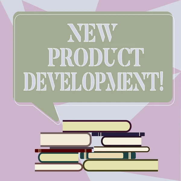 Writing note showing New Product Development. Business photo showcasing Process of bringing a new product to the marketplace Uneven Pile of Hardbound Books and Rectangular Speech Bubble.