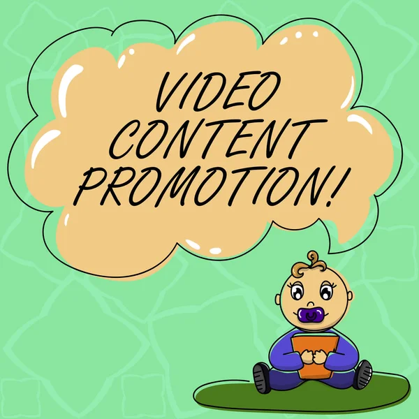 Word writing text Video Content Promotion. Business concept for video with the intent to promote the products Baby Sitting on Rug with Pacifier Book and Blank Color Cloud Speech Bubble.