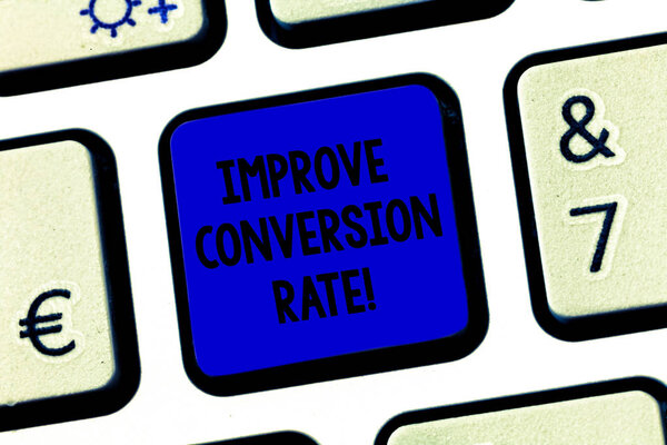 Conceptual hand writing showing Improve Conversion Rate. Business photo text Increase the percentage of visitors to your website Keyboard key Intention to create computer message idea.