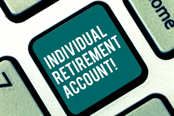 Handwriting text Individual Retirement Account. Concept meaning Invest and earmark funds for retirement Keyboard key Intention to create computer message pressing keypad idea.
