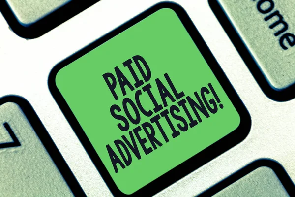 Conceptual hand writing showing Paid Social Advertising. Business photo text external marketing efforts involve a paid placement Keyboard key Intention to create computer message idea.
