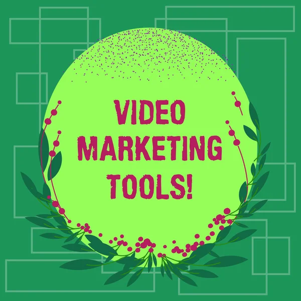 Writing note showing Video Marketing Tools. Business photo showcasing Technique used to increase audience engagement Blank Color Oval Shape with Leaves and Buds as Border for Invitation. — Stock Photo, Image