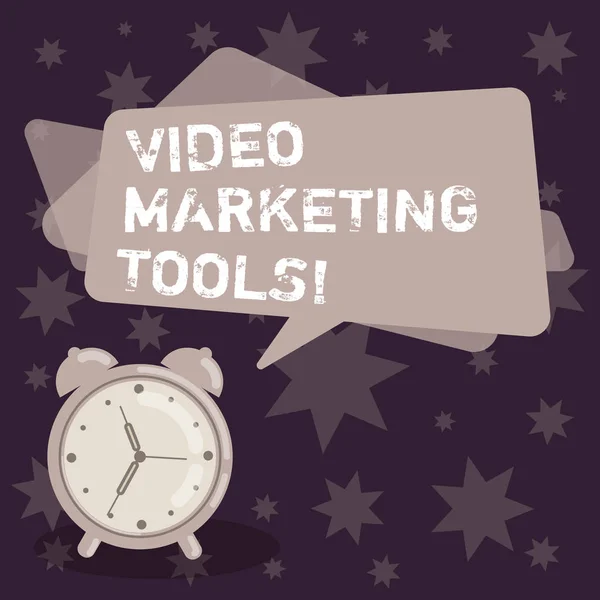 Handwriting text writing Video Marketing Tools. Concept meaning Technique used to increase audience engagement Blank Rectangular Color Speech Bubble Overlay and Analog Alarm Clock. — Stock Photo, Image