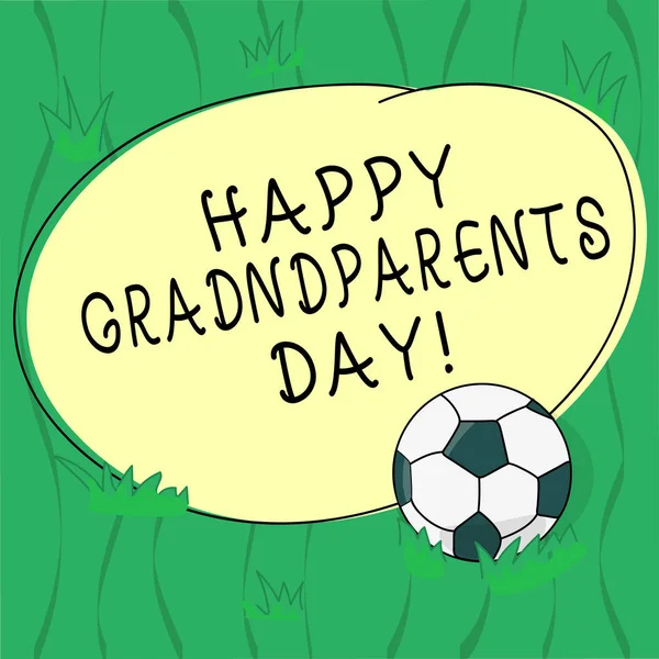 Word writing text Happy Grandparents Day. Business concept for National holiday to celebrate and honor grandparents Soccer Ball on the Grass and Blank Outlined Round Color Shape photo.