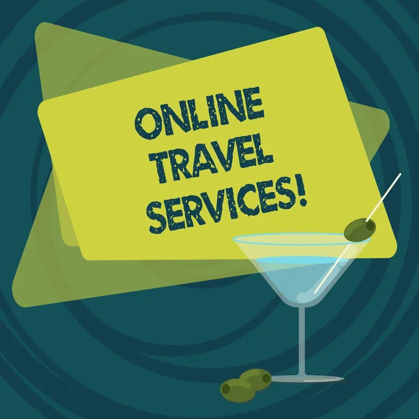 Text sign showing Online Travel Services. Conceptual photo Runs travel and tourism related service to the public Filled Cocktail Wine Glass with Olive on the Rim Blank Color Text Space.