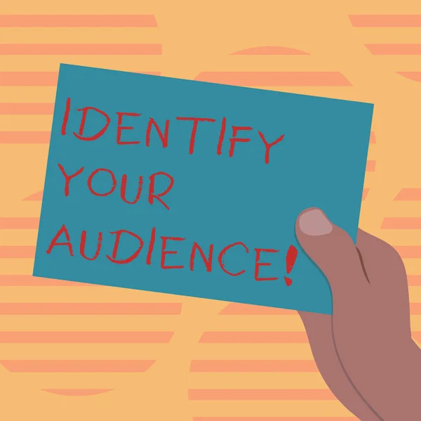 Word writing text Identify Your Audience. Business concept for Figuring out the target audience and their needs Drawn Hu analysis Hand Holding Presenting Blank Color Paper Cardboard photo. — Stock Photo, Image
