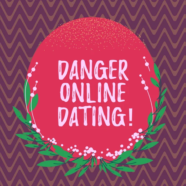 Word writing text Danger Online Dating. Business concept for The risk of meeting or dating demonstrating meet online Blank Color Oval Shape with Leaves and Buds as Border for Invitation.