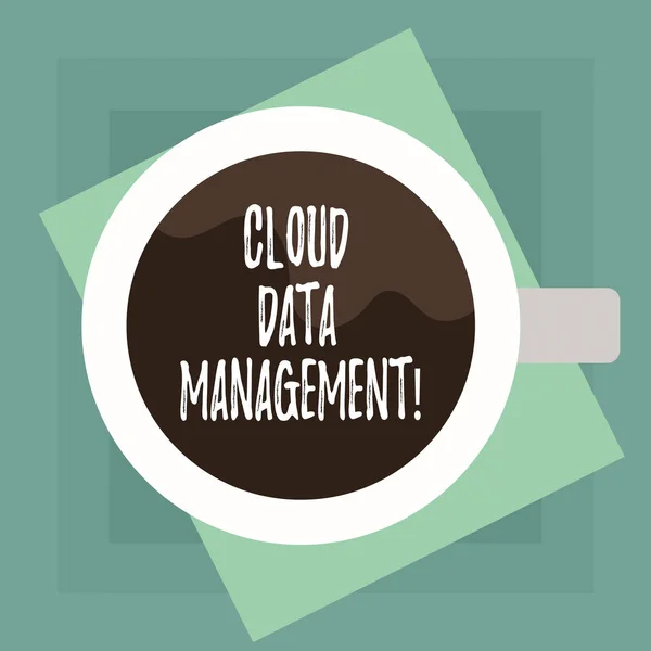 Conceptual hand writing showing Cloud Data Management. Business photo text A technique to analysisage data across cloud platforms Top View of Drinking Cup Filled with Beverage on Color Paper.
