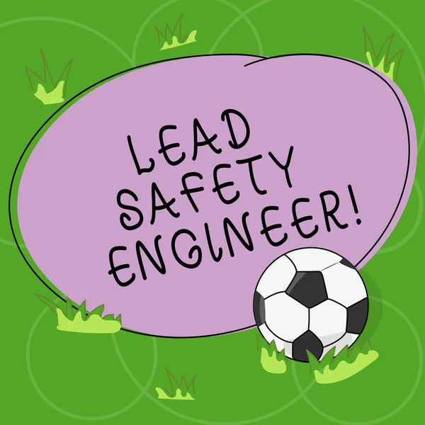 Word writing text Lead Safety Engineer. Business concept for develop policies to ensure safety of an all concerns Soccer Ball on the Grass and Blank Outlined Round Color Shape photo.