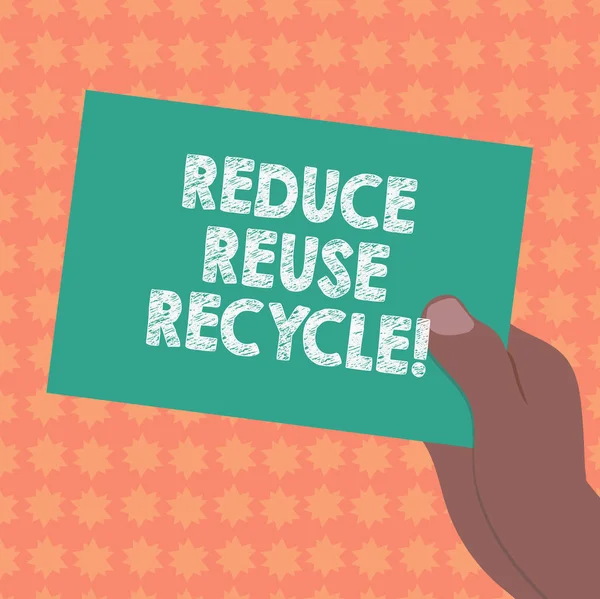 Writing note showing Reduce Reuse Recycle. Business photo showcasing Cut down on the amount of garbage we make each year Drawn Hu analysis Hand Holding Blank Color Paper Cardboard.