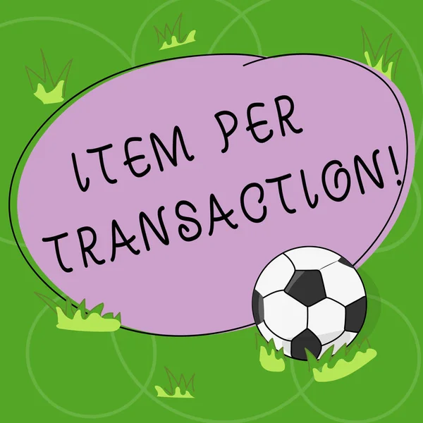 Word writing text Item Per Transaction. Business concept for Average number of products sold in each customer deal Soccer Ball on the Grass and Blank Outlined Round Color Shape photo.