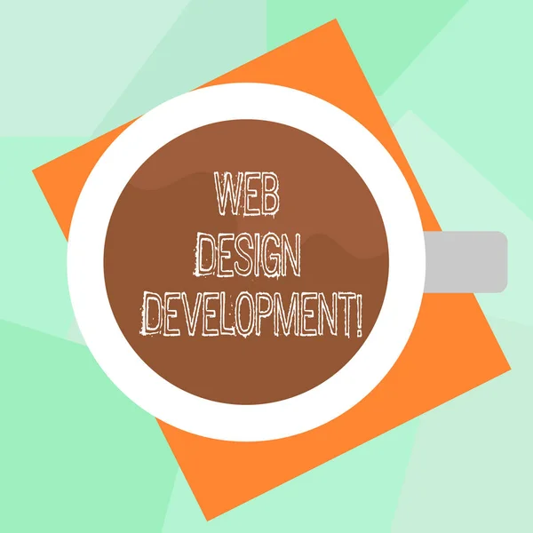 Conceptual hand writing showing Web Design Development. Business photo text developing websites for hosting via intranet Top View of Drinking Cup Filled with Beverage on Color Paper. — Stock Photo, Image