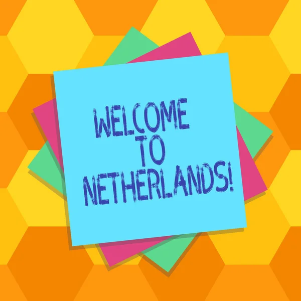 Handgeschreven tekst Welkom naar Nederland. Begrip betekenis warme groet aan de bezoekers van Nederland meerdere laag van lege bladen kleur papier karton foto met schaduw. — Stockfoto