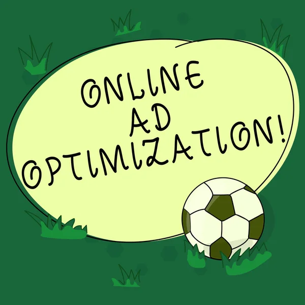 Text sign showing Online Ad Optimization. Conceptual photo Improving the perforanalysisce of a text PPC advertisement Soccer Ball on the Grass and Blank Outlined Round Color Shape photo.