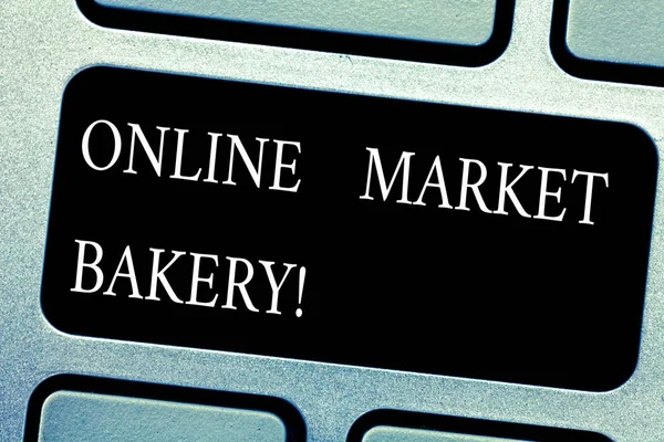 Handwriting text Online Market Bakery. Concept meaning Produces and sells flourbased food baked in oven Keyboard key Intention to create computer message pressing keypad idea.