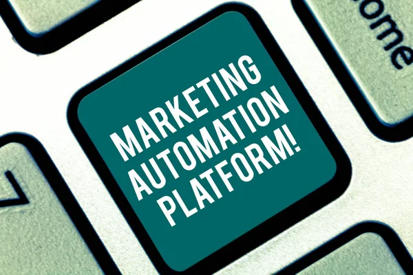 Handwriting text Marketing Automation Platform. Concept meaning automate repetitive task related to marketing Keyboard key Intention to create computer message pressing keypad idea.