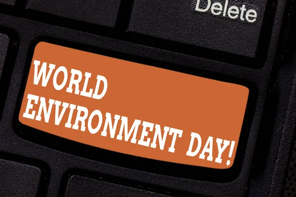 Word writing text World Environment Day. Business concept for awareness and the protection of our environment Keyboard key Intention to create computer message pressing keypad idea.