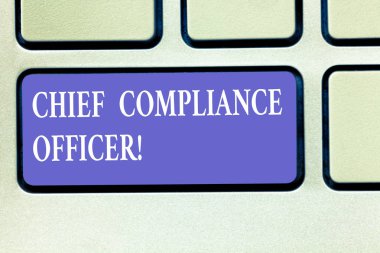 Text sign showing Chief Compliance Officer. Conceptual photo oversees the Corporate Compliance Program Keyboard key Intention to create computer message pressing keypad idea. clipart