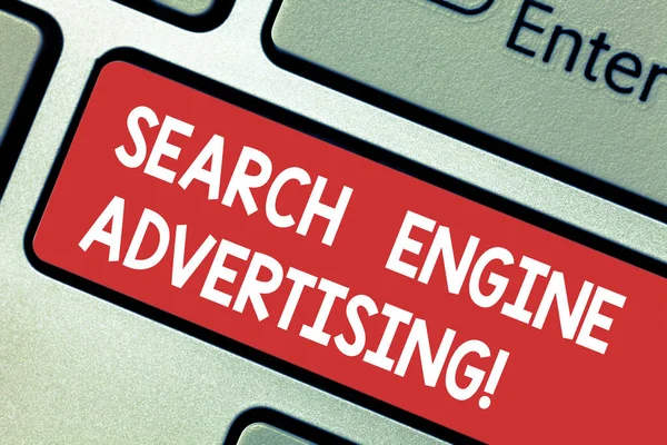 Text sign showing Search Engine Advertising. Conceptual photo method of placing an online advertisements Keyboard key Intention to create computer message pressing keypad idea.