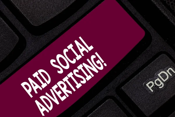 Conceptual hand writing showing Paid Social Advertising. Business photo showcasing external marketing efforts involve a paid placement Keyboard key Intention to create computer message idea.