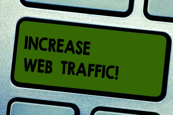 Text sign showing Increase Web Traffic. Conceptual photo Boost the amount of data transmitted by site visitors Keyboard key Intention to create computer message pressing keypad idea.