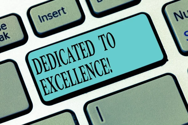 Writing note showing Dedicated To Excellence. Business photo showcasing a pledge or promise to do something exceptionally Keyboard key Intention to create computer message pressing keypad idea.