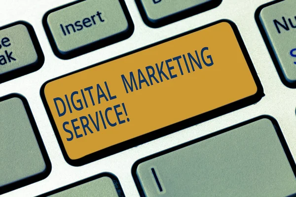 Conceptual hand writing showing Digital Marketing Service. Business photo showcasing services using digital channels to reach consumers Keyboard key Intention to create computer message idea.