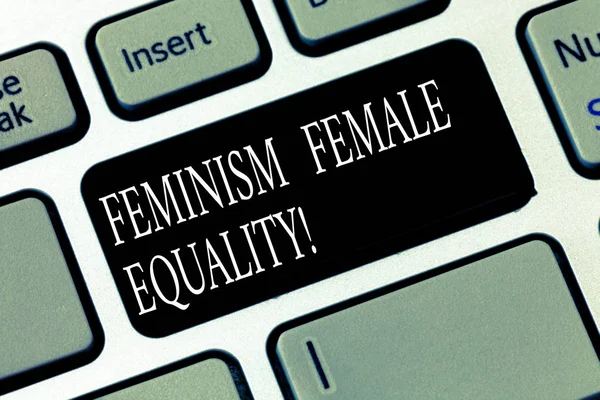 Text sign showing Feminism Female Equality. Conceptual photo advocacy of women s is rights on equality of sexes Keyboard key Intention to create computer message pressing keypad idea.