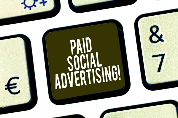 Conceptual hand writing showing Paid Social Advertising. Business photo showcasing external marketing efforts involve a paid placement Keyboard key Intention to create computer message idea.