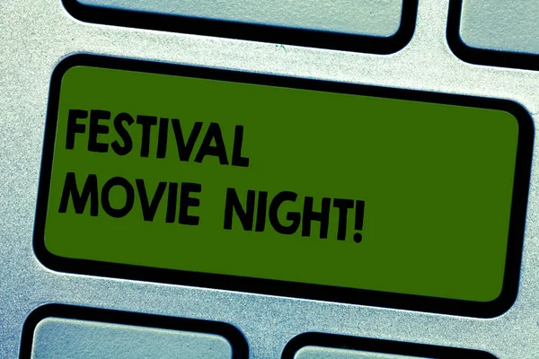 Text sign showing Festival Movie Night. Conceptual photo analysisy friends get together to watch movies together Keyboard key Intention to create computer message pressing keypad idea.