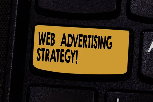Text sign showing Web Advertising Strategy. Conceptual photo uses existing social networks to promote a product Keyboard key Intention to create computer message pressing keypad idea.