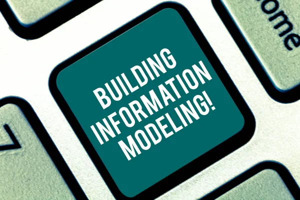 Handwriting text Building Information Modeling. Concept meaning an intelligent 3D modelbased process Keyboard key Intention to create computer message pressing keypad idea.