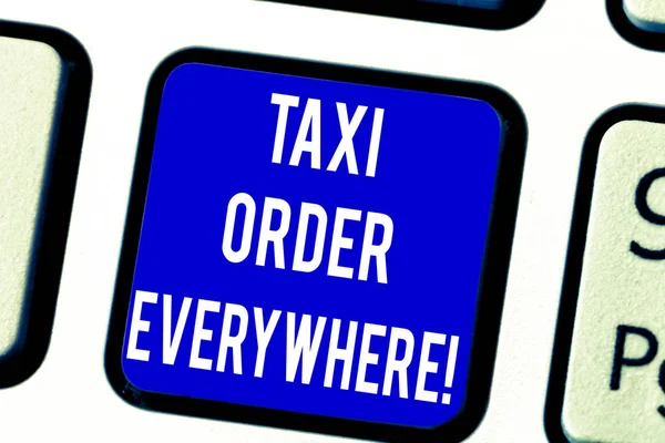 Text sign showing Taxi Order Everywhere. Conceptual photo hired cab to carry passenger to its designation Keyboard key Intention to create computer message pressing keypad idea.