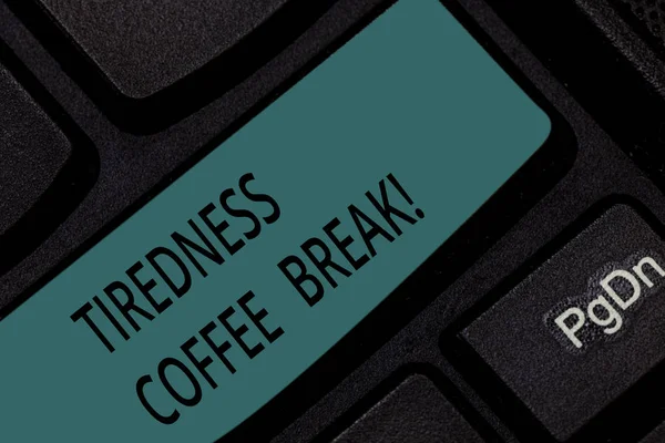 Handwriting text Tiredness Coffee Break. Concept meaning short period for rest and refreshments to freshen up Keyboard key Intention to create computer message pressing keypad idea.