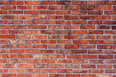 Od kırmızı tuğla duvar doku arka plan. turuncu renkli, geniş vintage tarzı tuğla duvar