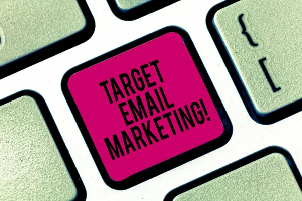 Handwriting text writing Target Email Marketing. Concept meaning advertisement is sent to a target list of recipients Keyboard key Intention to create computer message pressing keypad idea.