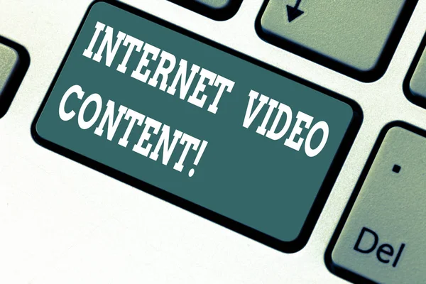 Writing note showing Internet Video Content. Business photo showcasing Deals with transmission of video over the Internet Keyboard key Intention to create computer message pressing keypad idea.