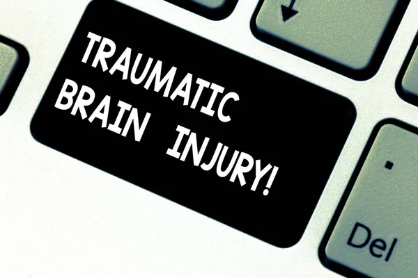 Conceptual hand writing showing Traumatic Brain Injury. Business photo showcasing Insult to the brain from an external mechanical force Keyboard key Intention to create computer message idea.