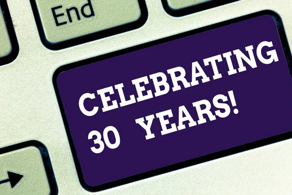 Handwriting text Celebrating 30 Years. Concept meaning Commemorating a special day being 30 years together Keyboard key Intention to create computer message pressing keypad idea. — Stock Photo, Image
