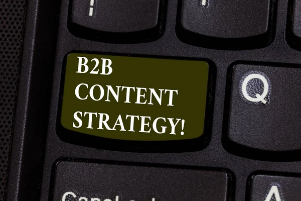 Handwriting text B2B Content Strategy. Concept meaning Distributing curated, relevant and valuable content Keyboard key Intention to create computer message pressing keypad idea.