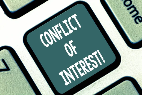 Writing note showing Conflict Of Interest. Business photo showcasing interests of public duty versus private interests Keyboard key Intention to create computer message pressing keypad idea.