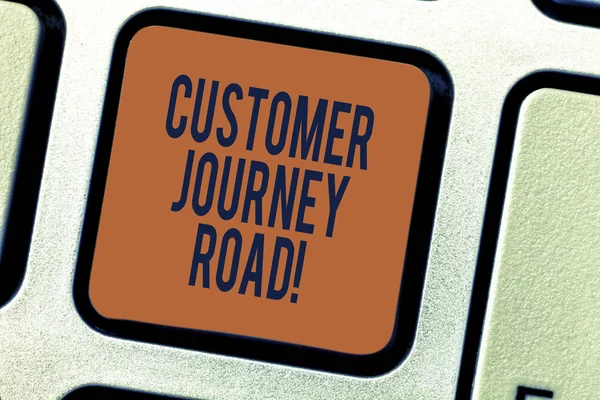 Text sign showing Customer Journey Road. Conceptual photo Customer experiences when interacting your brand Keyboard key Intention to create computer message pressing keypad idea.