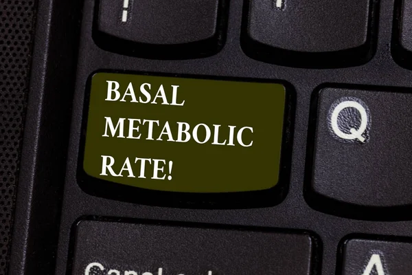 Handwriting text Basal Metabolic Rate. Concept meaning Minimum energy level require to sustain vital function Keyboard key Intention to create computer message pressing keypad idea.